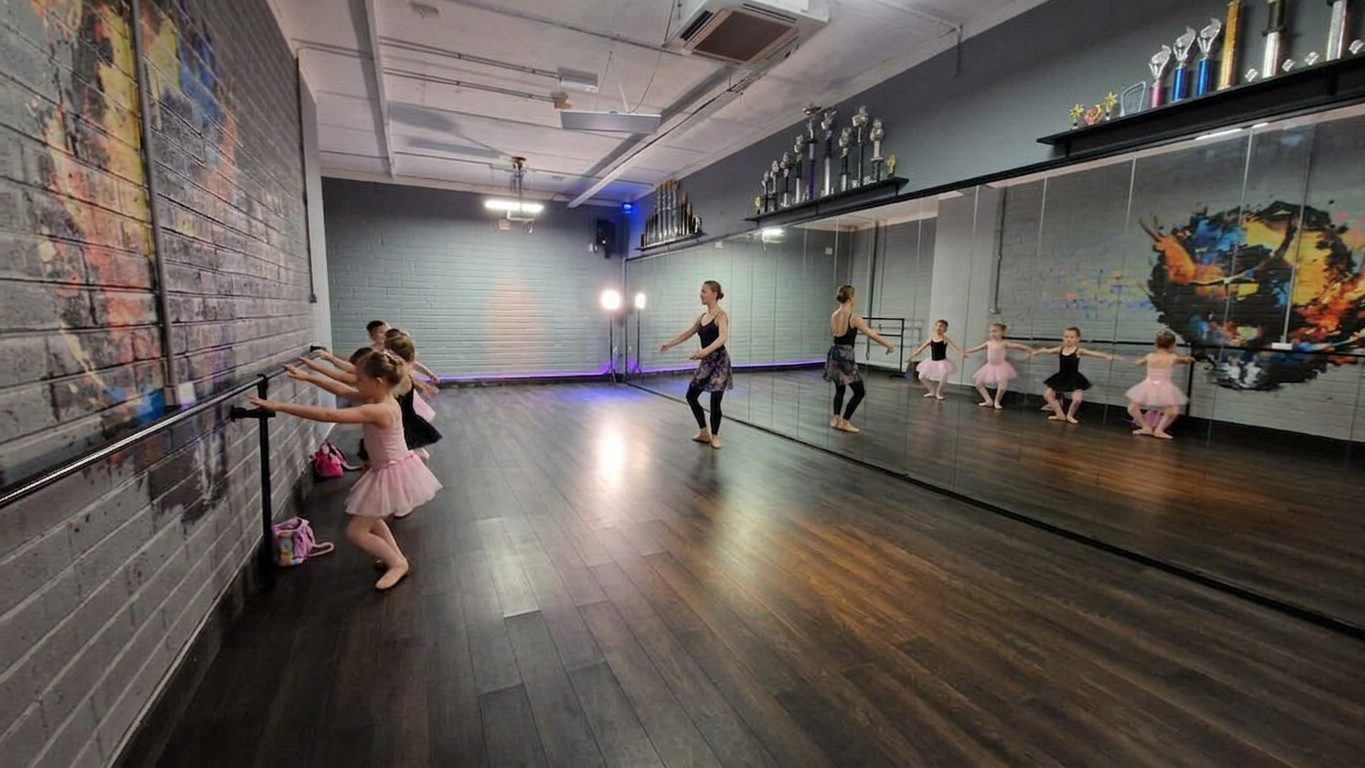 dance studio with young girls dancing